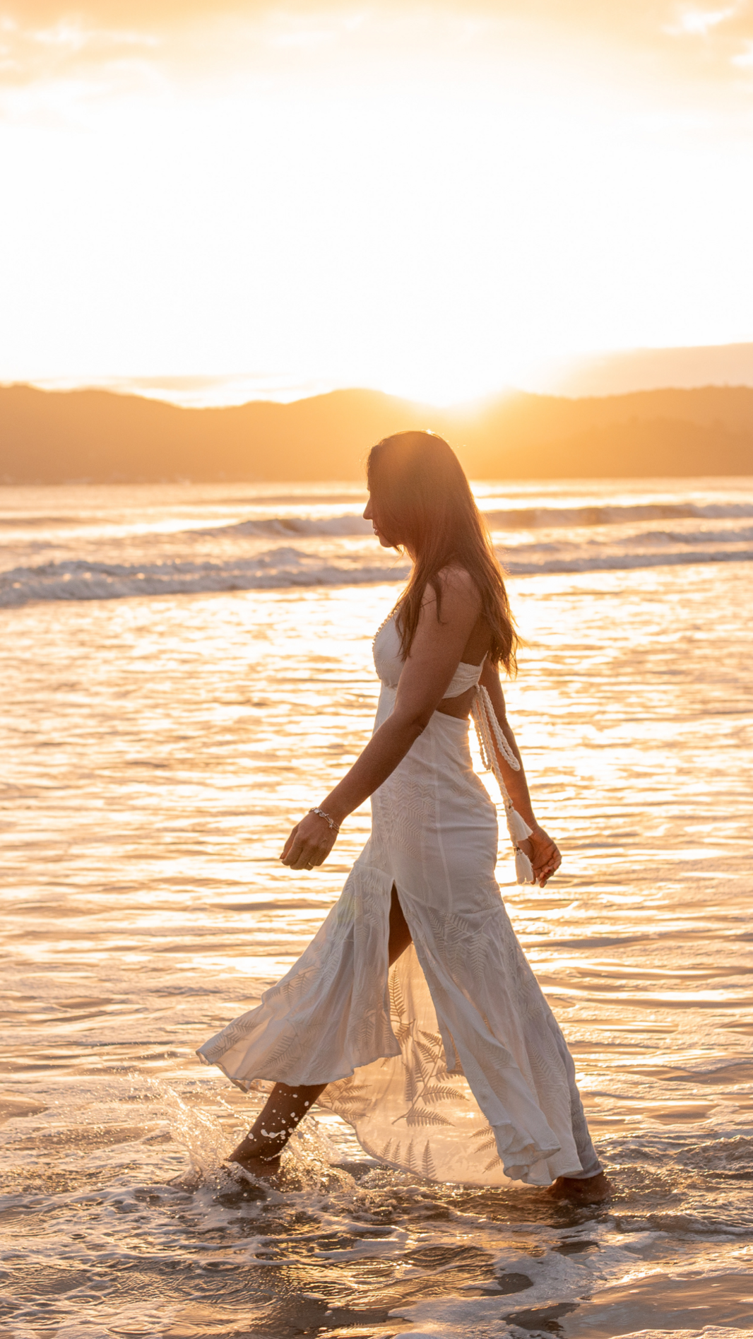 billede af kvinde i solnedgang