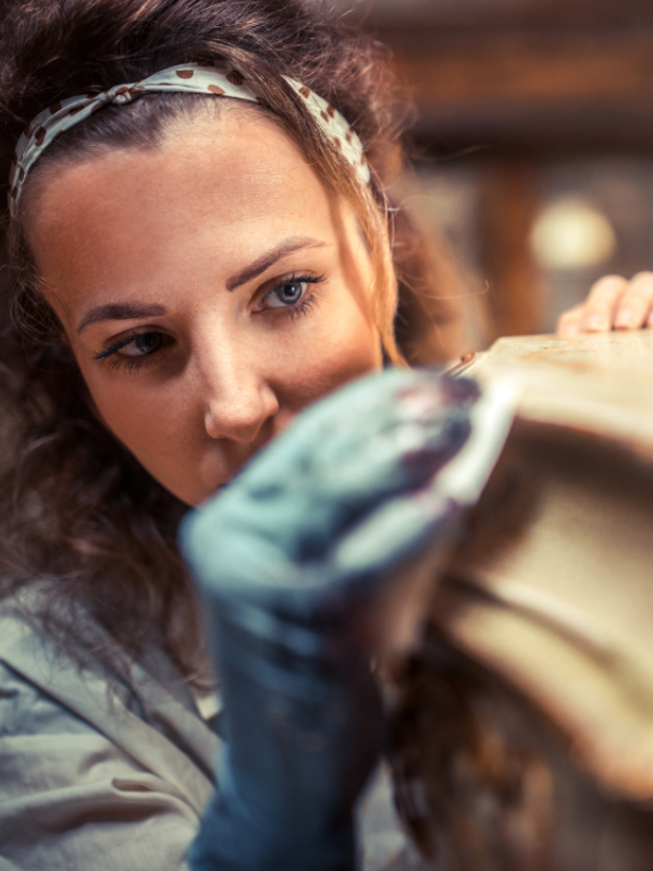 woman sanding 