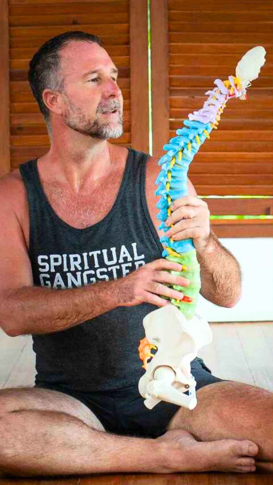 Yogi Aaron Holding Spine