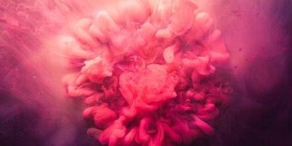 A billowing cloud of pink smoke