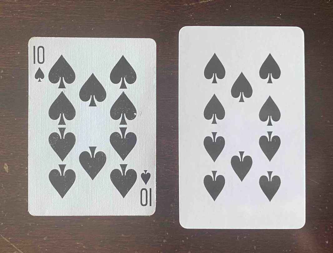 10 Spades Compare