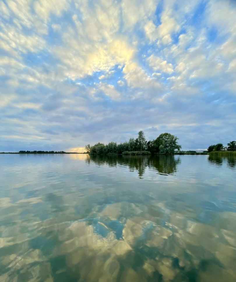 Yellow clouds reflected in the lake