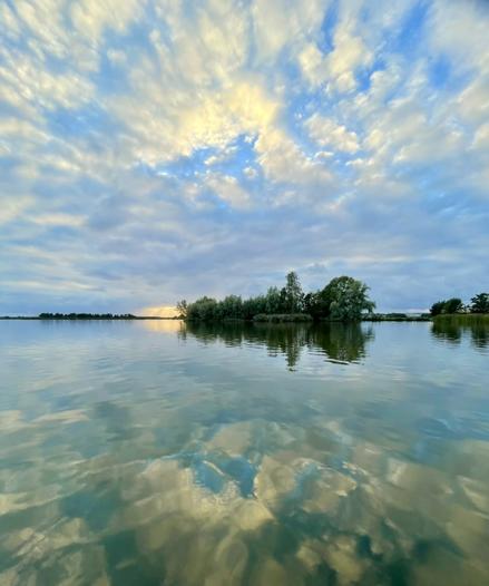 Yellow clouds reflected in the lake