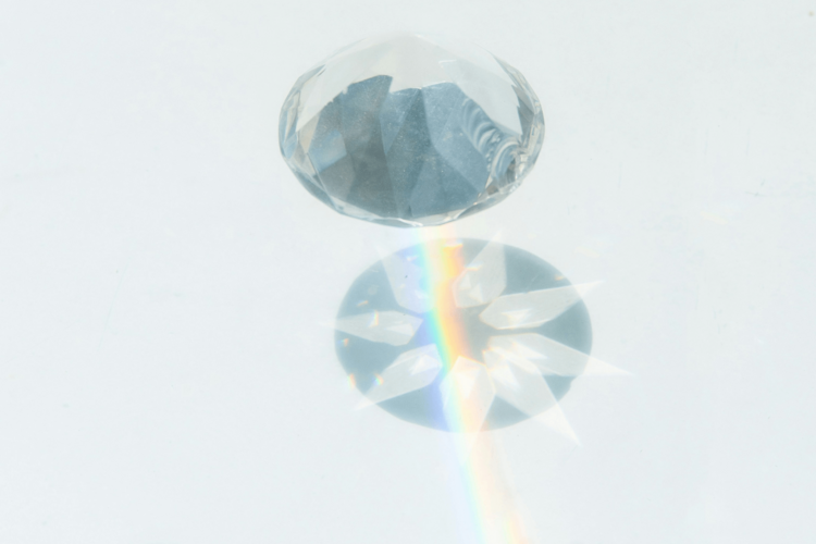 Faceted crystal with shadow light and rainbow