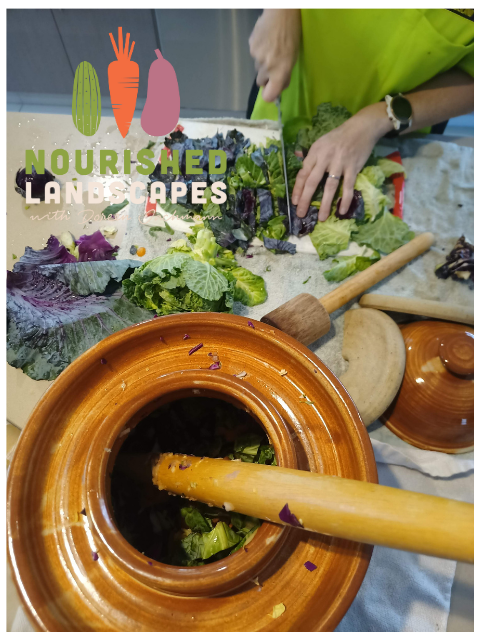 Sauerkraut making: cutting up the veggies and stomping them in the fermenter to release the juices.