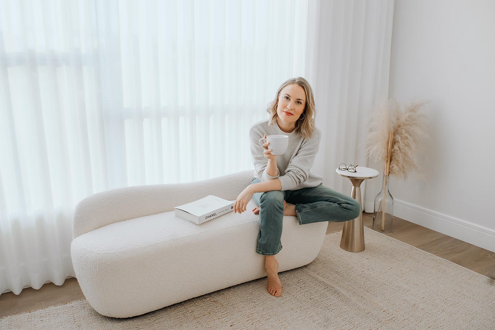 Robyn James sitting with coffee