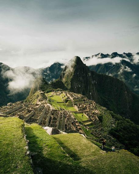 Machu Picchu citadel among green mountain peaks