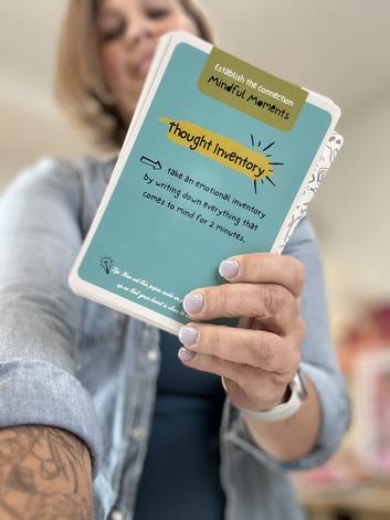 Tish holding thought inventory card