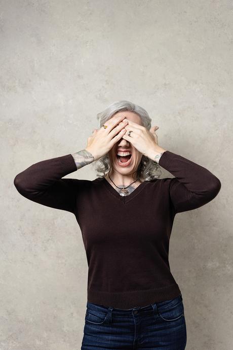 Blaze with hands over eyes, recalling her own moment of overwhelm.