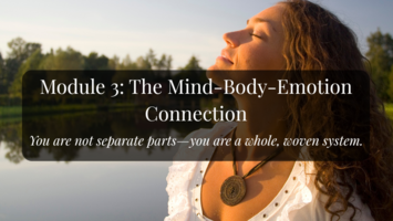 Natural golden light of a sunrise on a young woman's face. Her chin is lifted to the sky, her eyes are closed in calm and peace. She stands in front of a lake and wears a necklace that reminds us of a compass.