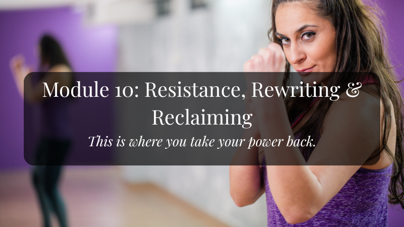A woman raises her bare fists at a boxing class, giving the viewer a wry smile.