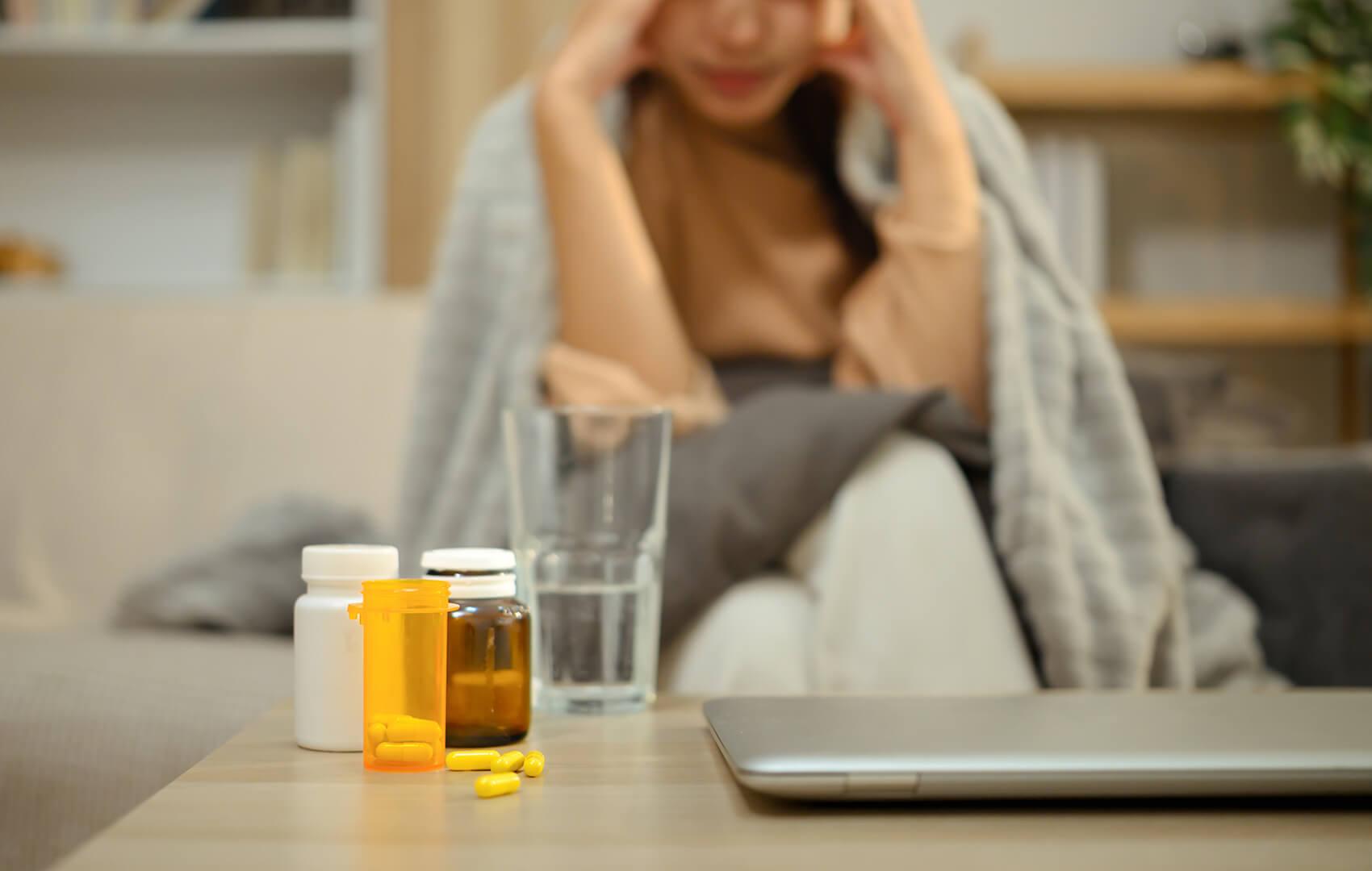 close-up-of-medicine-bottles-and-a-glass-of-water-2025-06-05-23-29-08-utc (1)