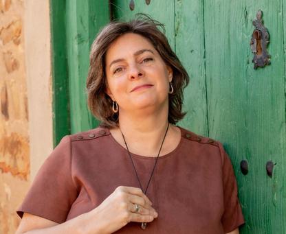 Christi Byerly, founder of Awaken Coach Institute, embodying the lifelong journey of growth and presence at the heart of spiritual awakening coaching