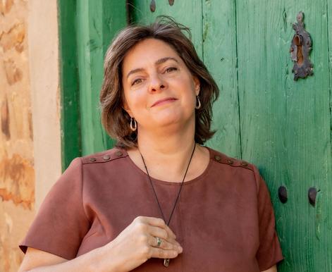 Christi Byerly, founder of Awaken Coach Institute, embodying the lifelong journey of growth and presence at the heart of spiritual awakening coaching