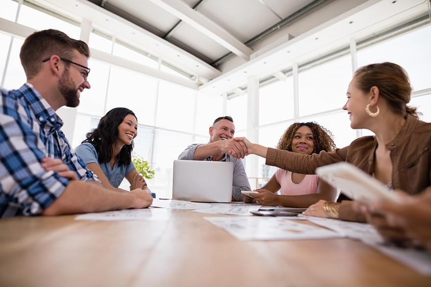 executives-shaking-hands-in-the-meeting-2M4XTHF