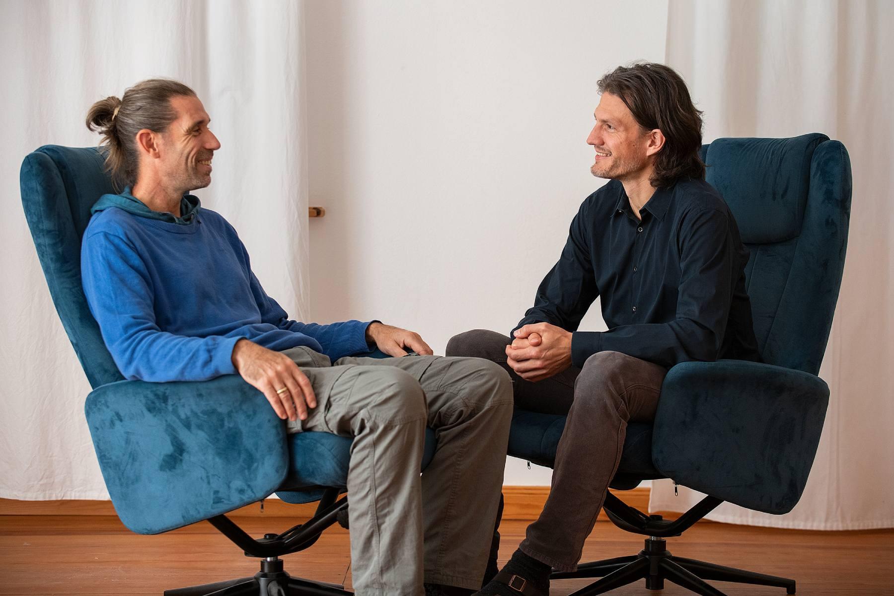 About me - Timm Christophel with male client at intake conversation in practice