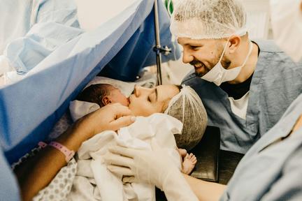 cesarean birth, baby with mom and dad