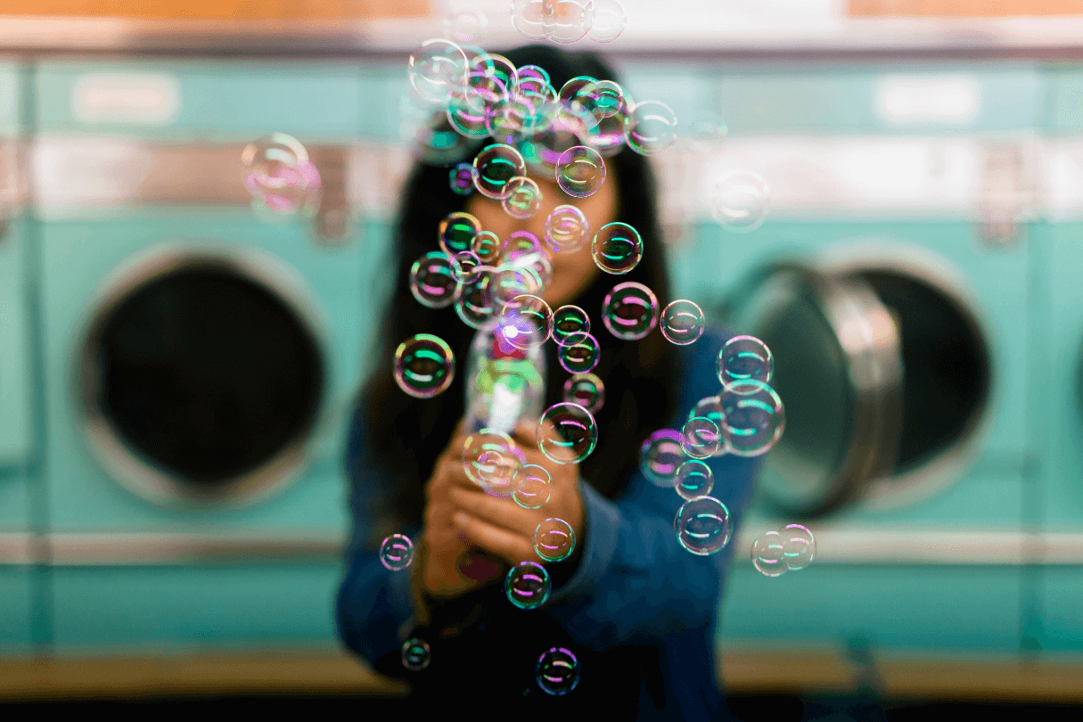 person playing with bubbles
