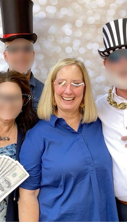 A woman standing next to a beach, doing stretches