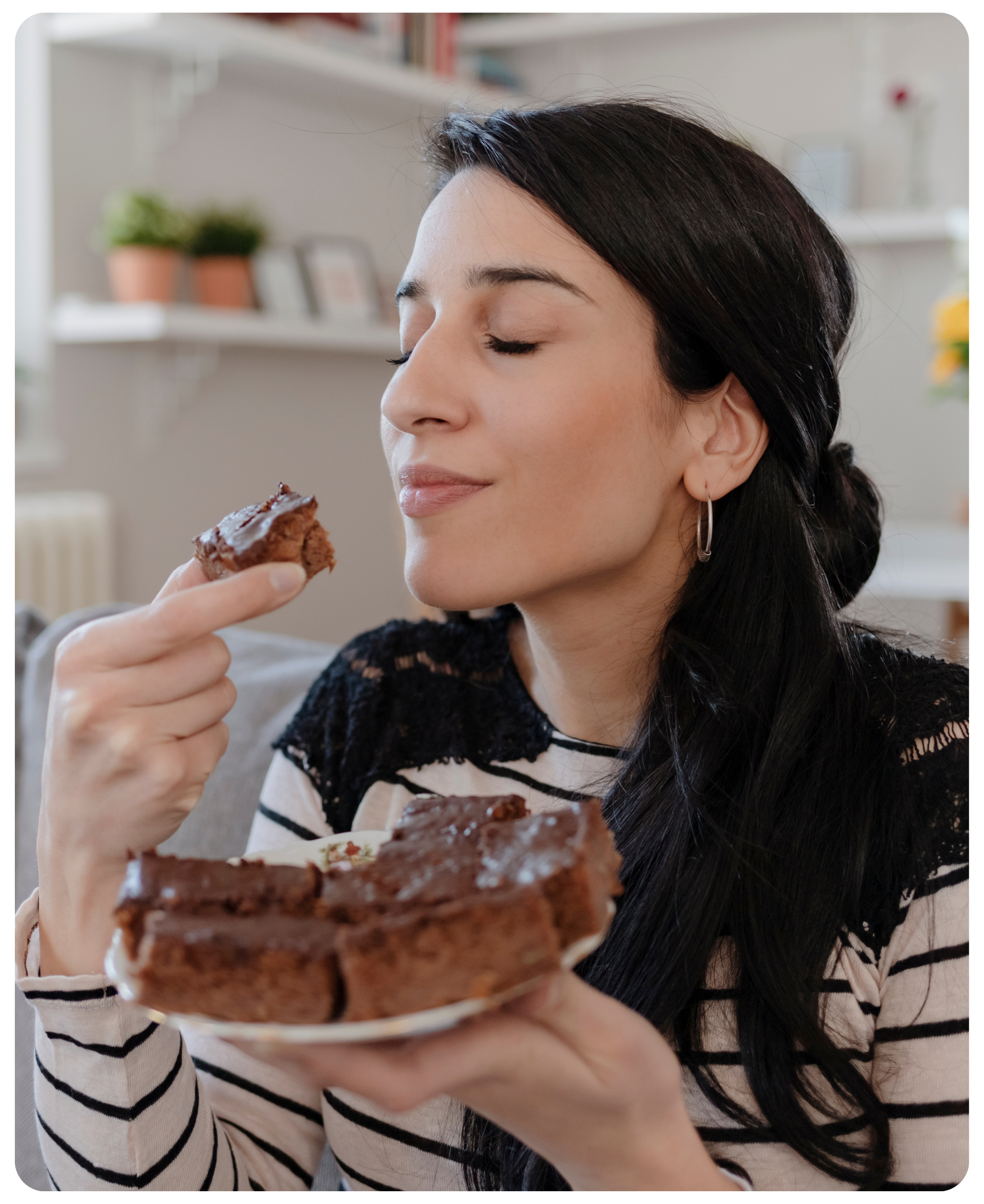 woman eating brownie