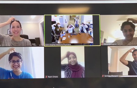 A corporate team participates in tapping training with Dr. Jill Wener via video conferencing.