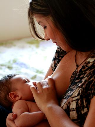 Mother breastfeeding a baby