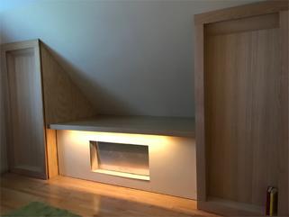 Guest room by day — the bathtub completely concealed