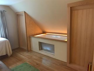 The enclosure opens — the Japanese soaking tub revealed