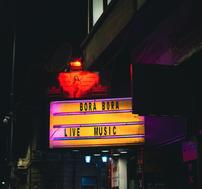 A lighted marquee reading, "Bora Bora Live Music"