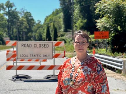 Emma after Hurricane Helen near a road closed sign