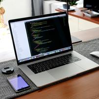 A laptop showing code