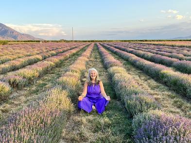 Pamela sitting in a lavender field