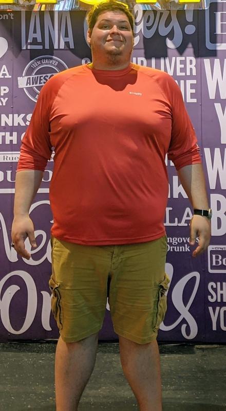 A man before his weight loss with Zenith Coaching Academy