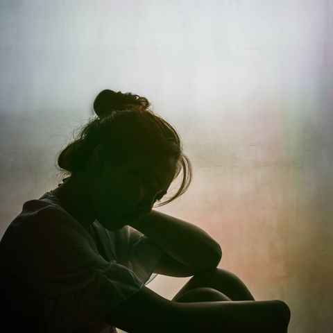 vintage-filtered-on-silhouette-of-depressed-girl-royalty-free-image-882747904-1547678451.jpg