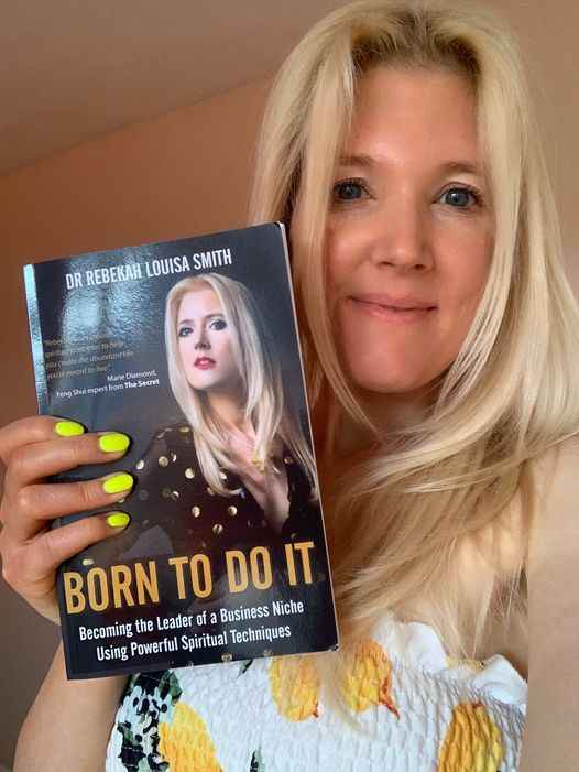 Rebekah with her book Dec 2020 BORN TO DO IT