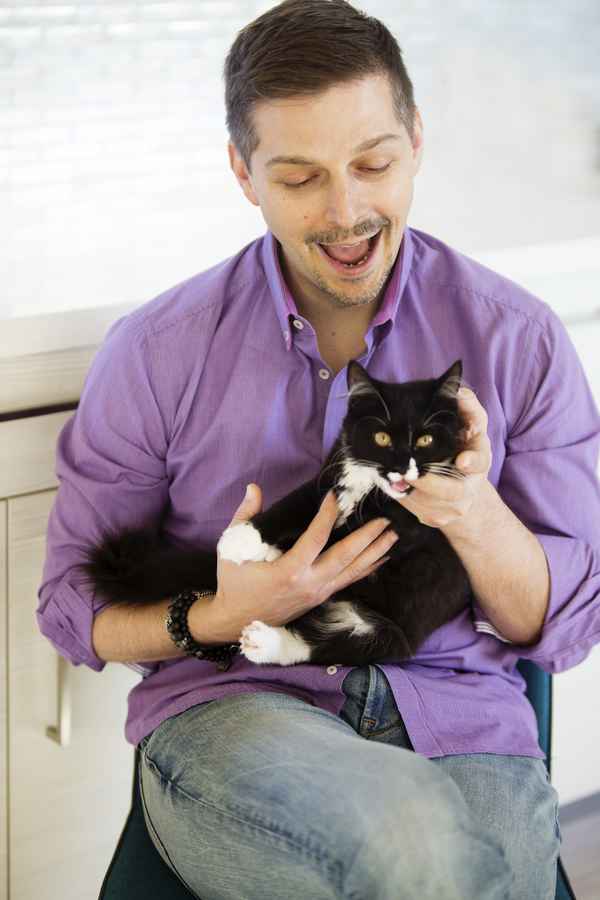 Nick Hansinger with Chloe the cat