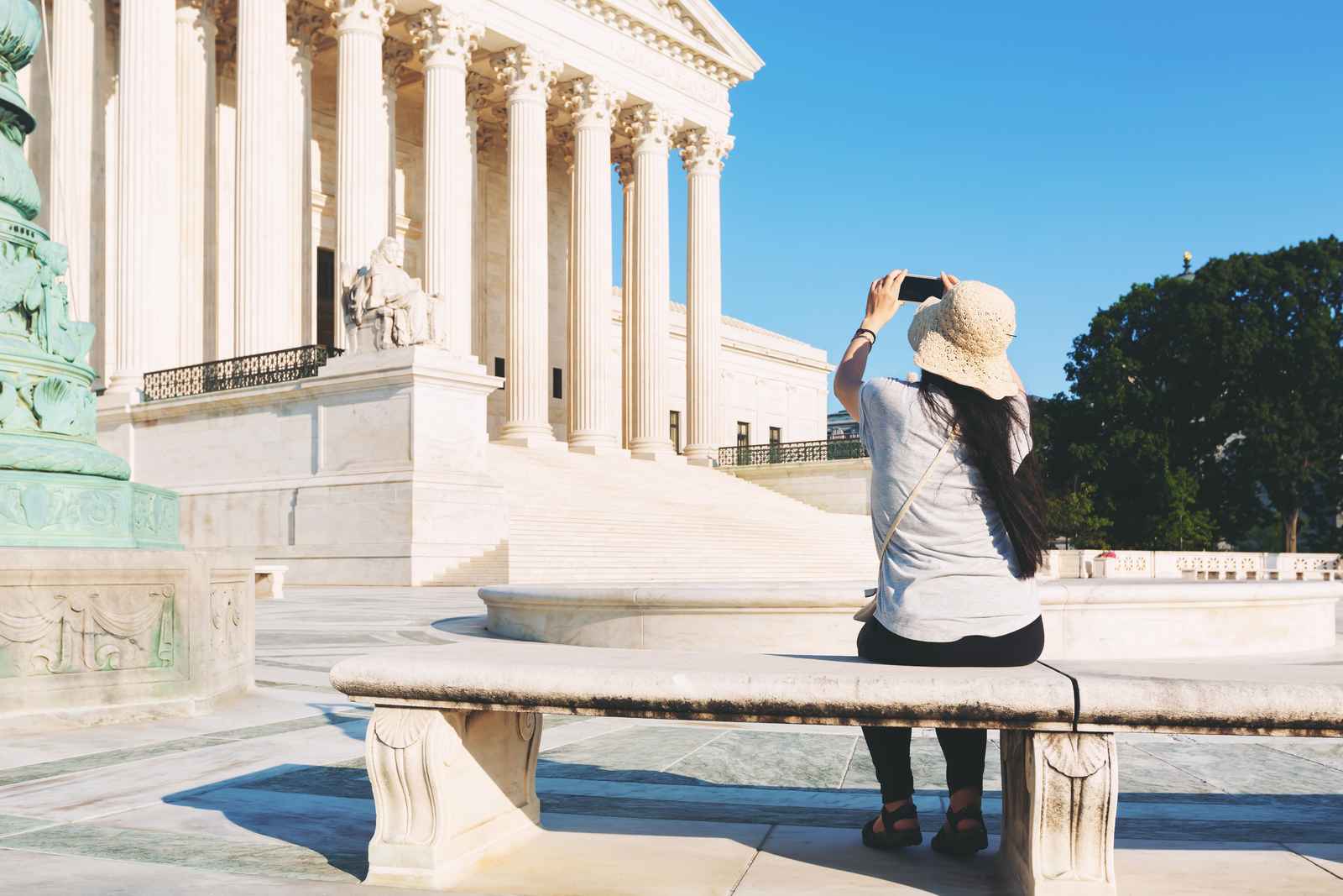 graphicstock-woman-taking-a-photo-of-the-supreme-court-of-the-united-states-in-washington-dc_SDF76r2VdW