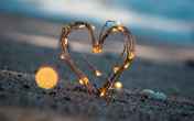 heart lights in sand
