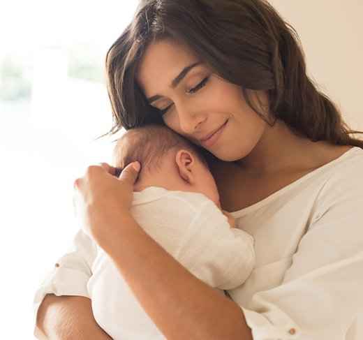 Woman_Holding_Baby.width-520