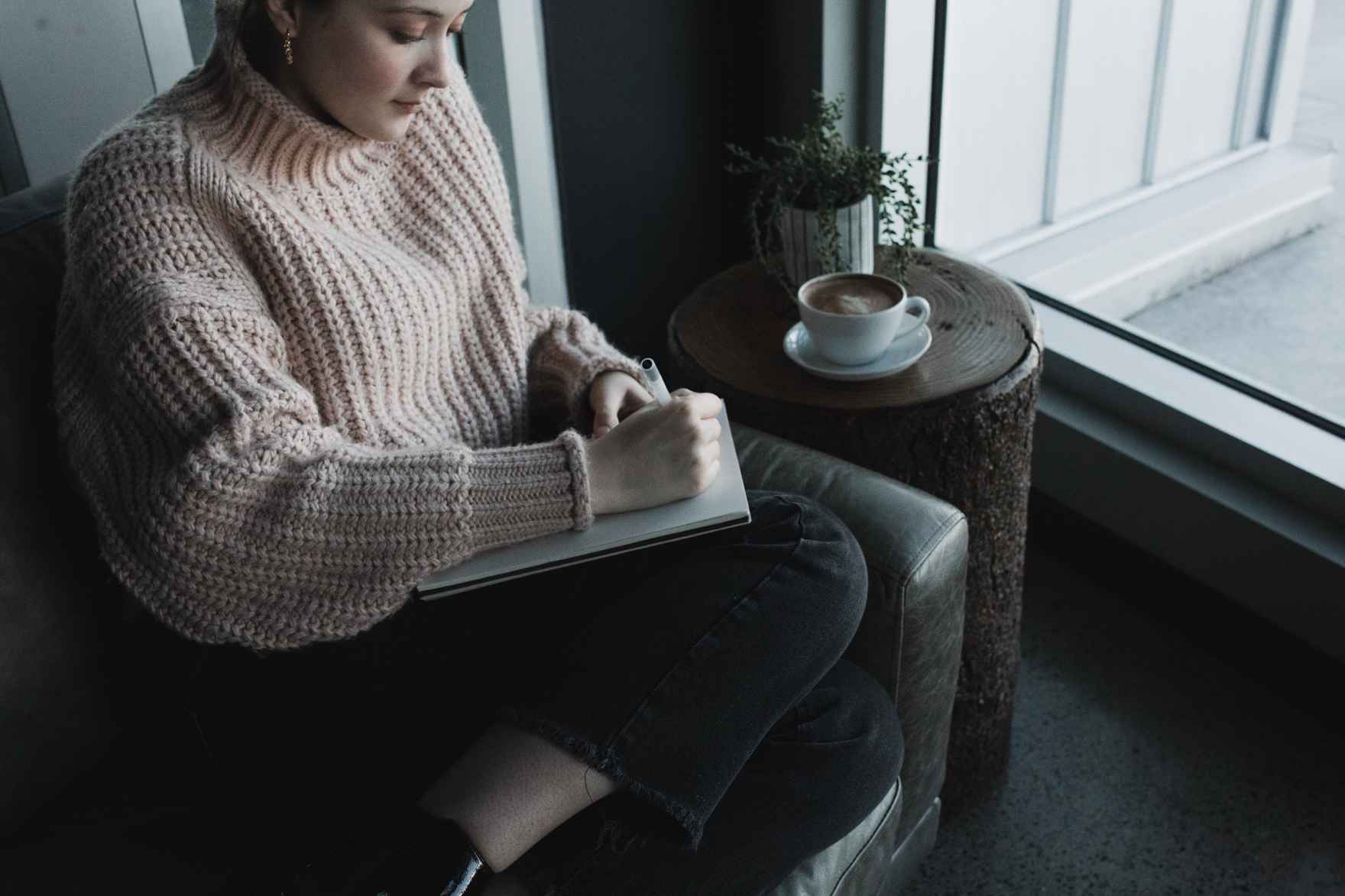 woman writing notes