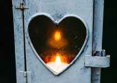 cathal-mac-an-bheatha-heart stove window candle