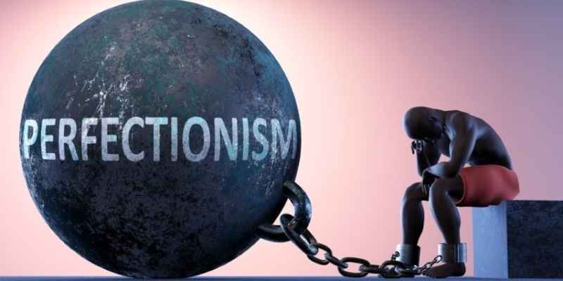 perfectionism-man-in-chains-1-2