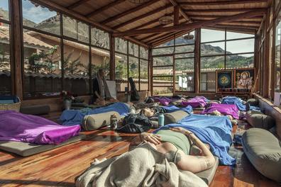 The shala laid out with bolsters and blankets for deep practice