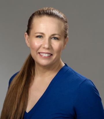 headshot of Valerie Tate, owner of A Clever Cat