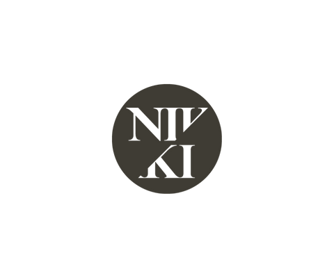 Nikki Clark logo gray