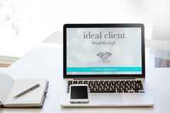 ideal client breakthrough virtual workshop laptop iphone notebook pencil desk airy home office