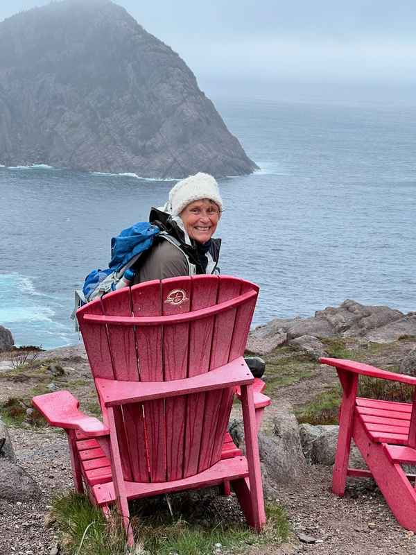 1. Jax Smiling in Red Adirondack Chair