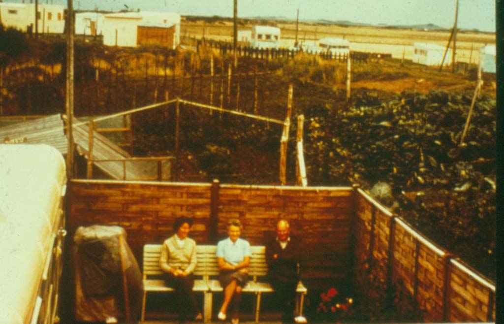 13 Caddys and Dorothy in garden early days