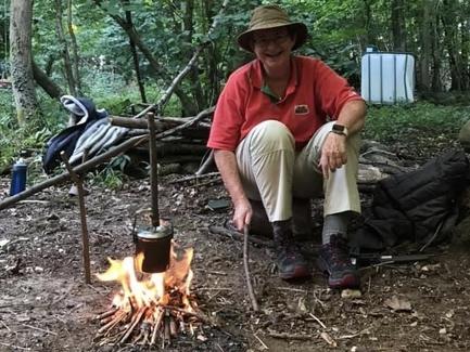 Rebecca lighting a fire