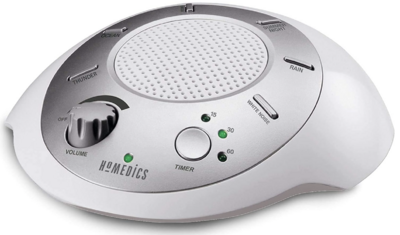 homedics sound machine, white with silver accents, buttons, and dial